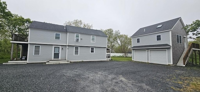 7 Candle Maker Cir, Edgartown, MA 02539 - rear view of house featuring an attached garage