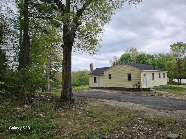 461 N Orange Rd, Athol, MA 01331 - view of side of property featuring a chimney and asphalt driveway