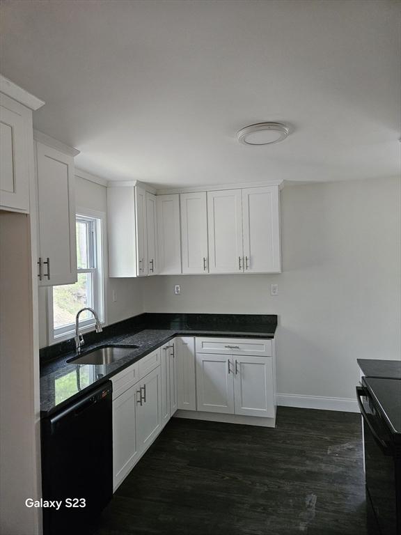 461 N Orange Rd, Athol, MA 01331 - kitchen with dishwasher, white cabinets, range, dark wood-style flooring, and dark stone countertops