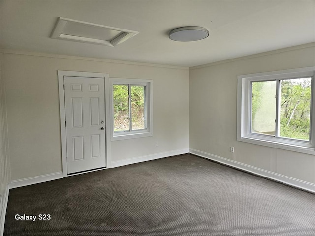 461 N Orange Rd, Athol, MA 01331 - unfurnished room featuring attic access, dark carpet, and crown molding