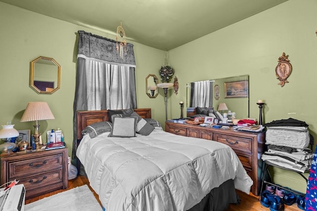 439 Walnut Ave, Boston, MA 02119 - bedroom featuring wood finished floors and lofted ceiling