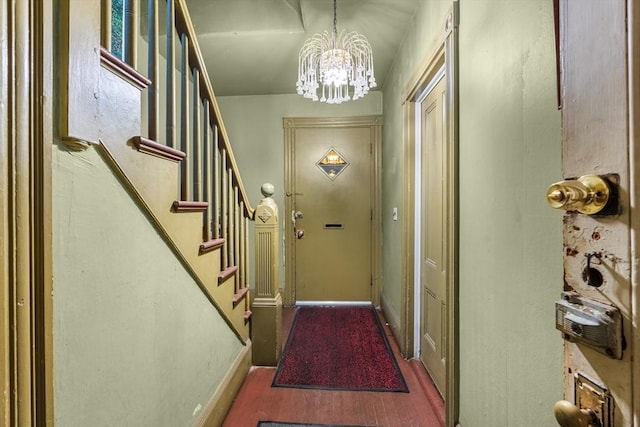 439 Walnut Ave, Boston, MA 02119 - entryway featuring a chandelier and stairway
