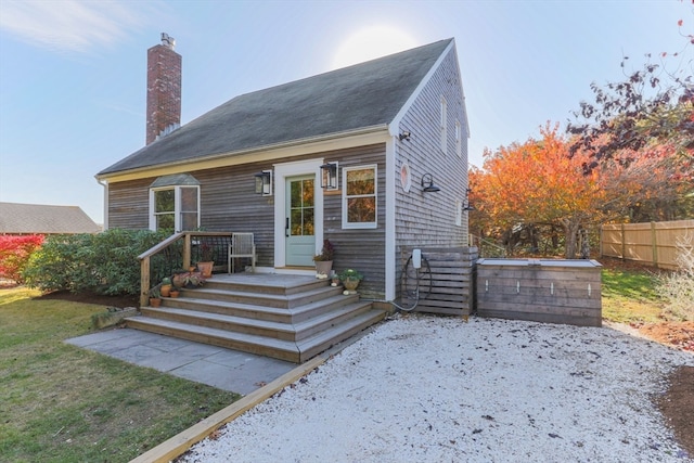 view of front of home with a front yard