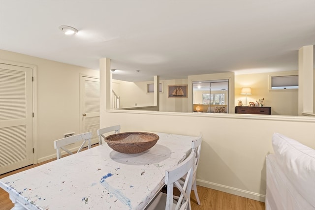 dining room with light wood-type flooring