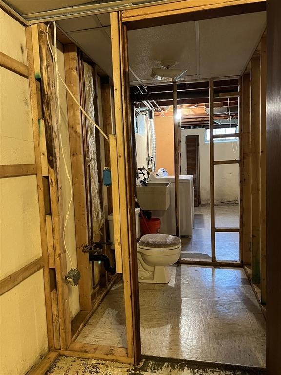 50 Feltham Rd, Springfield, MA 01118 - below grade area featuring independent washer and dryer and a sink