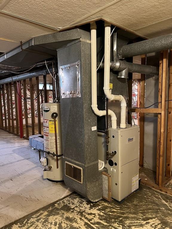 50 Feltham Rd, Springfield, MA 01118 - utility room featuring water heater