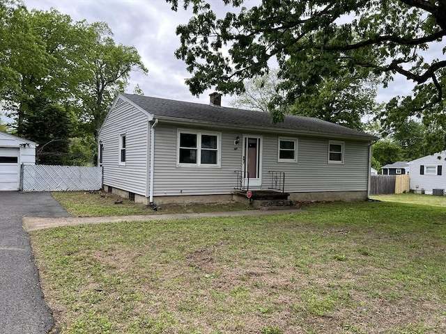 50 Feltham Rd, Springfield, MA 01118 - view of front of home with cooling unit, a chimney, an outdoor structure, and a garage