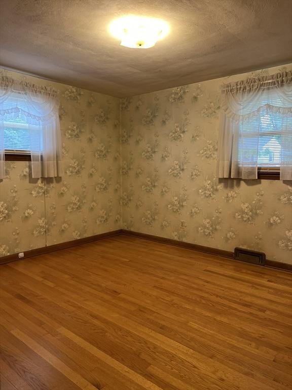 50 Feltham Rd, Springfield, MA 01118 - unfurnished room featuring wood finished floors