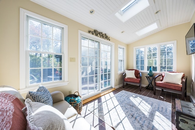 sunroom featuring lofted ceiling, a wealth of natural light, and wood ceiling