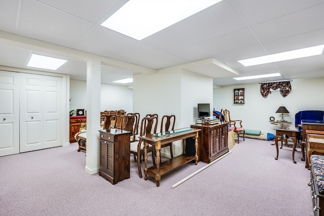 office area featuring light colored carpet and a drop ceiling