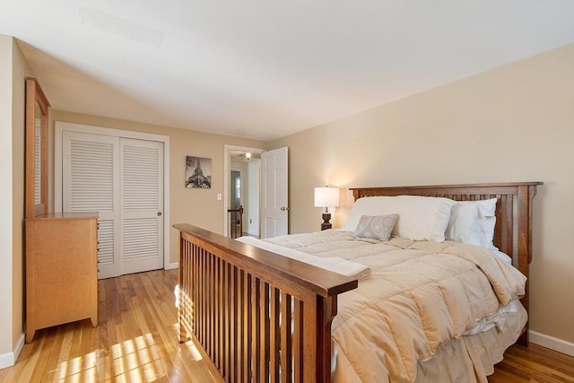 16 Kirsi Cir, Westford, MA 01886 - bedroom featuring light wood finished floors, baseboards, and a closet