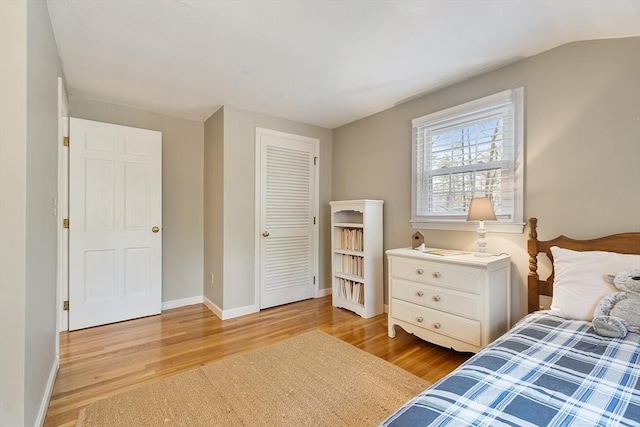16 Kirsi Cir, Westford, MA 01886 - bedroom with wood finished floors, baseboards, and a closet