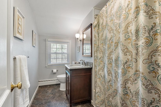 16 Kirsi Cir, Westford, MA 01886 - full bath featuring a baseboard radiator, toilet, vanity, baseboards, and vaulted ceiling