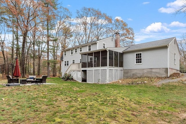 16 Kirsi Cir, Westford, MA 01886 - rear view of property with a sunroom, a chimney, a lawn, stairs, and an outdoor living space