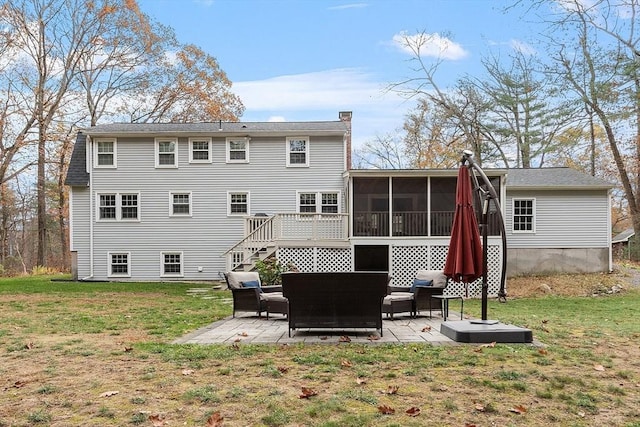 16 Kirsi Cir, Westford, MA 01886 - back of house with a patio area, a sunroom, a lawn, an outdoor living space, and a chimney