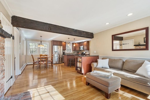16 Kirsi Cir, Westford, MA 01886 - living room with ornamental molding, light wood-style flooring, a baseboard heating unit, and recessed lighting