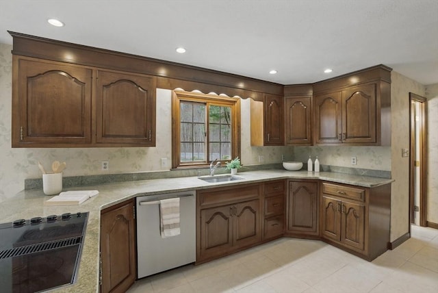kitchen featuring dishwasher, a sink, light countertops, light tile patterned floors, and recessed lighting