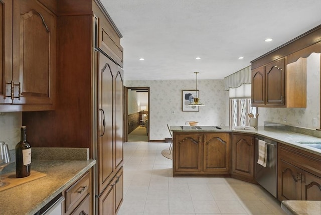 kitchen featuring hanging light fixtures, a peninsula, wallpapered walls, recessed lighting, and stainless steel dishwasher