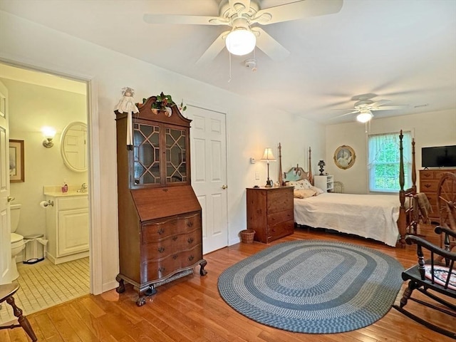 5 Boyle Rd, Gill, MA 01354 - bedroom featuring wood finished floors, connected bathroom, and ceiling fan