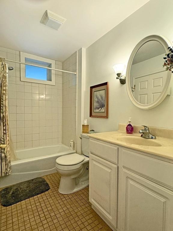 5 Boyle Rd, Gill, MA 01354 - full bathroom with vanity, shower / bathtub combination with curtain, and tile patterned floors