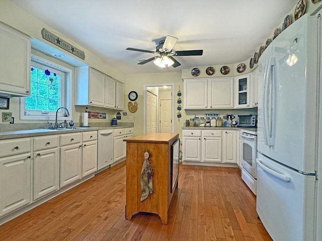 5 Boyle Rd, Gill, MA 01354 - kitchen with white appliances, white cabinetry, ceiling fan, and light wood-style floors