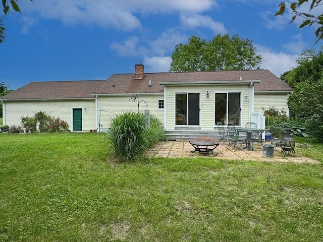 5 Boyle Rd, Gill, MA 01354 - back of house featuring a fire pit, a lawn, a patio, and a chimney