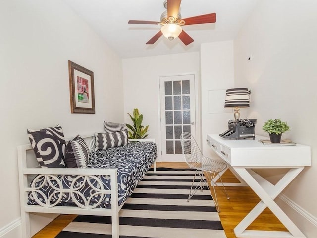 279 Beacon St Unit 1, Boston, MA 02116 - living room featuring wood finished floors, a ceiling fan, and baseboards