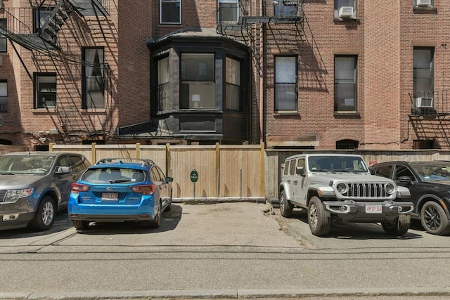 279 Beacon St Unit 1, Boston, MA 02116 - view of front of house with brick siding and uncovered parking
