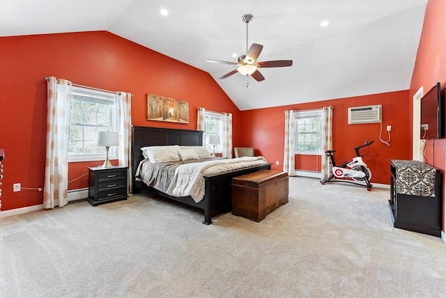 bedroom with light colored carpet, lofted ceiling, a wall unit AC, and a baseboard heating unit