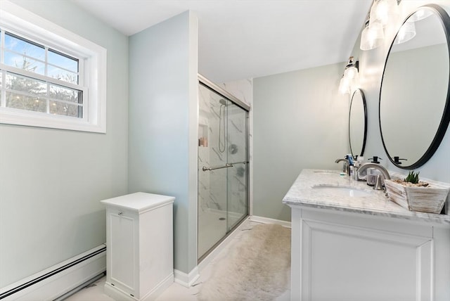 full bathroom featuring a baseboard radiator, baseboards, vanity, and a marble finish shower