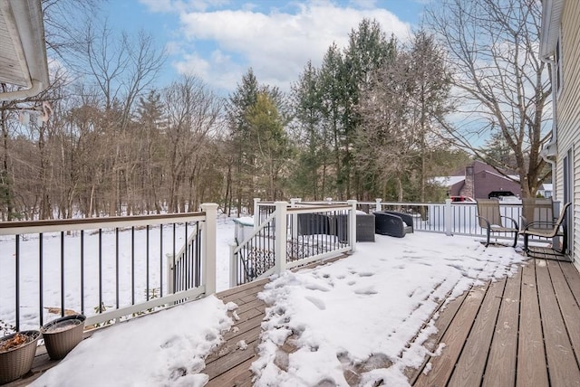 view of snow covered deck