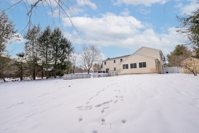 view of snow covered house