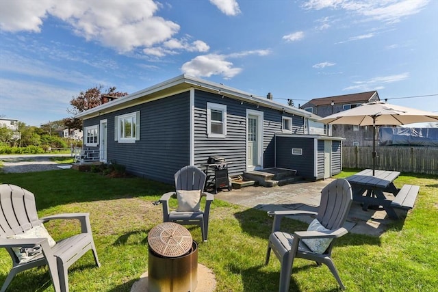rear view of house featuring a patio