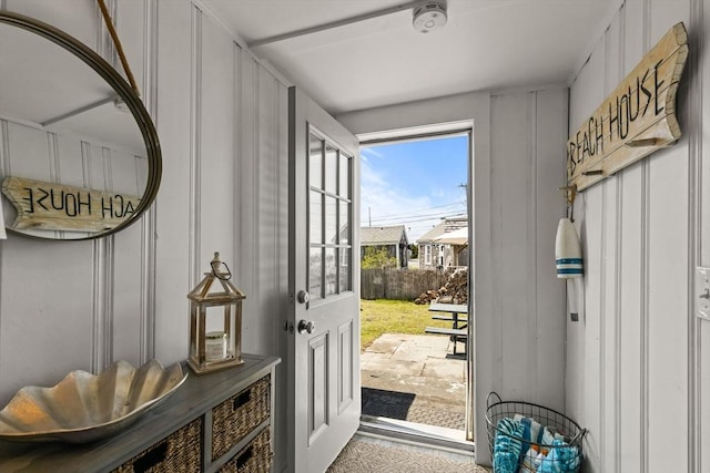 doorway with a decorative wall