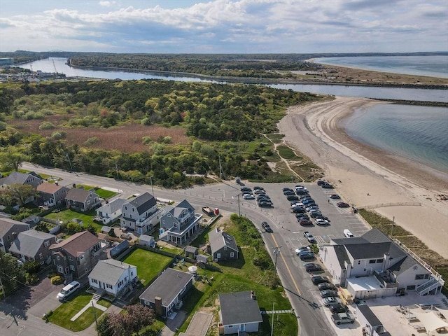 aerial perspective of suburban area featuring a nearby body of water
