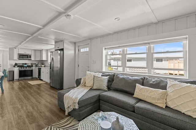 living room with wood finished floors