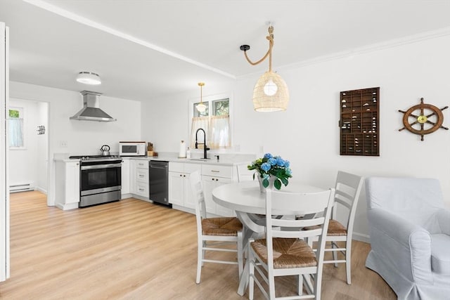 4 Agawam Ave, Ipswich, MA 01938 - kitchen featuring stainless steel electric range oven, wall chimney range hood, white microwave, black dishwasher, and a baseboard radiator