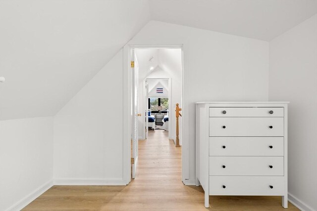 4 Agawam Ave, Ipswich, MA 01938 - bonus room with lofted ceiling, light wood finished floors, and baseboards