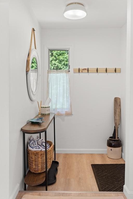 4 Agawam Ave, Ipswich, MA 01938 - doorway featuring wood finished floors and baseboards