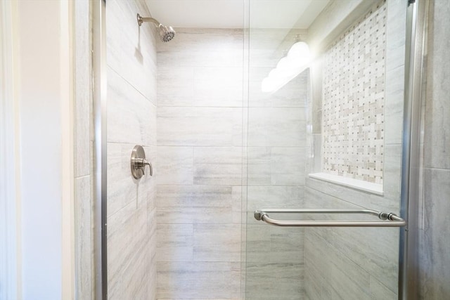 full bathroom with a shower stall