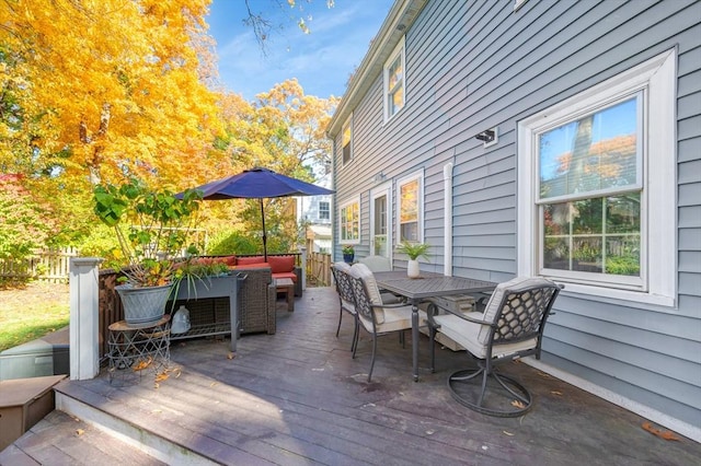 deck with outdoor lounge area