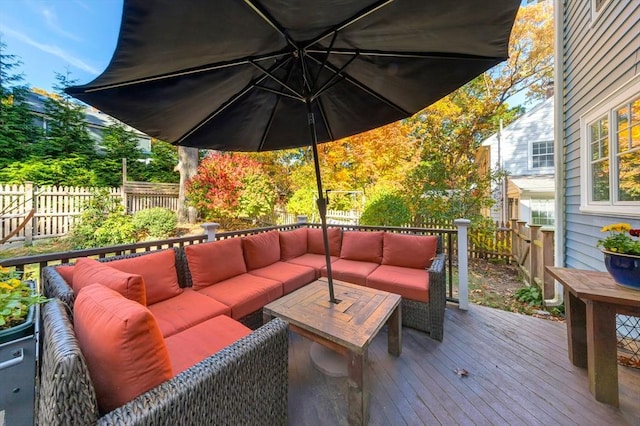 wooden deck with outdoor lounge area