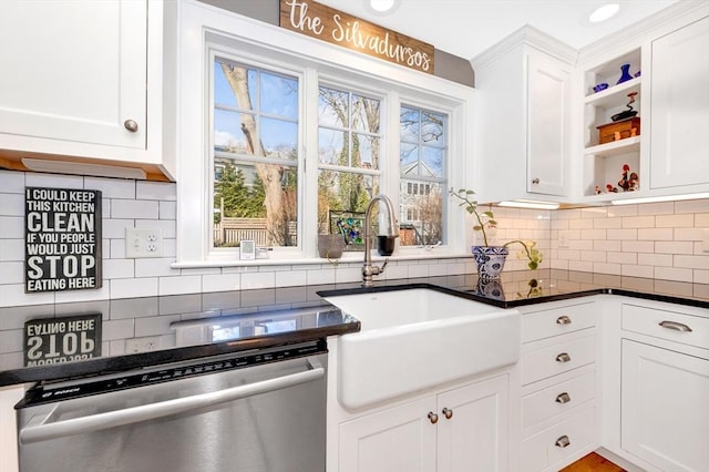 kitchen with white cabinetry, dishwasher, sink, and backsplash