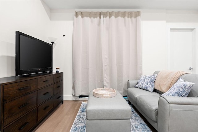 121 Portland St Unit 505, Boston, MA 02114 - living area with light wood finished floors and baseboards