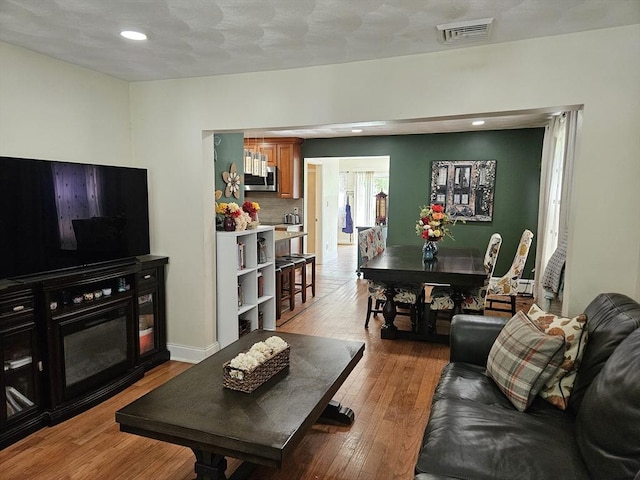 16 Boyd Ave, East Providence, RI 02914 - living room with light wood finished floors and recessed lighting