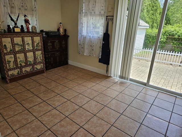 16 Boyd Ave, East Providence, RI 02914 - tiled spare room featuring baseboards