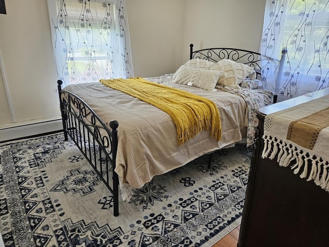 16 Boyd Ave, East Providence, RI 02914 - bedroom with a baseboard radiator and wood finished floors