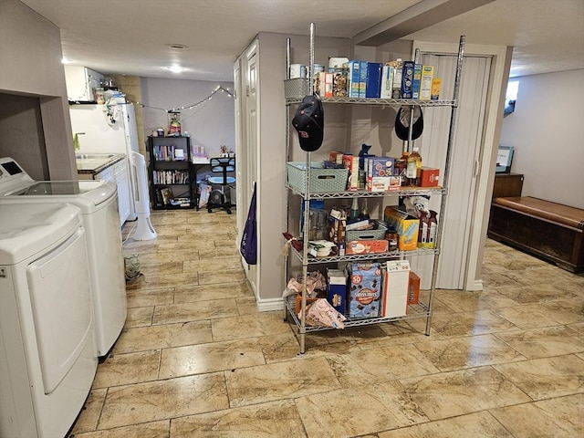16 Boyd Ave, East Providence, RI 02914 - laundry area with washer and clothes dryer and stone finish floors
