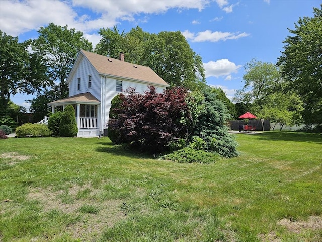 16 Boyd Ave, East Providence, RI 02914 - view of home's exterior featuring a chimney