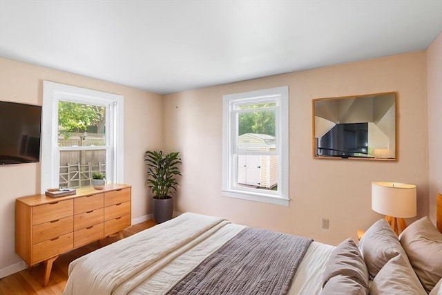 134 Hampton Cir, Hull, MA 02045 - bedroom with light wood-style flooring and baseboards